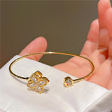 Rotating bracelet of bright petals
