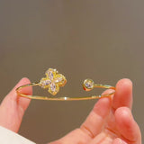 Rotating bracelet of bright petals